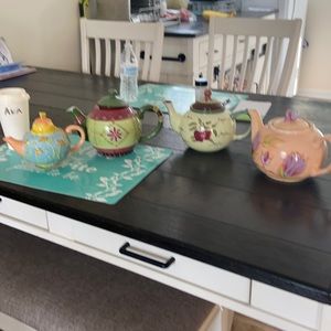 Four assorted tea pots. Ceramic.